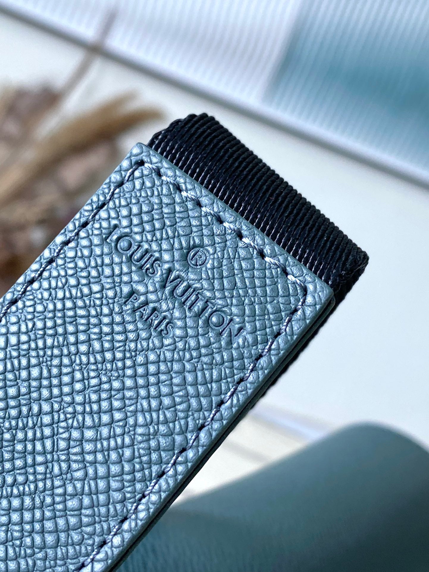 LOUIS VUITTON DISTRICT PM 26 IN CELESTE GREEN CALFSKIN