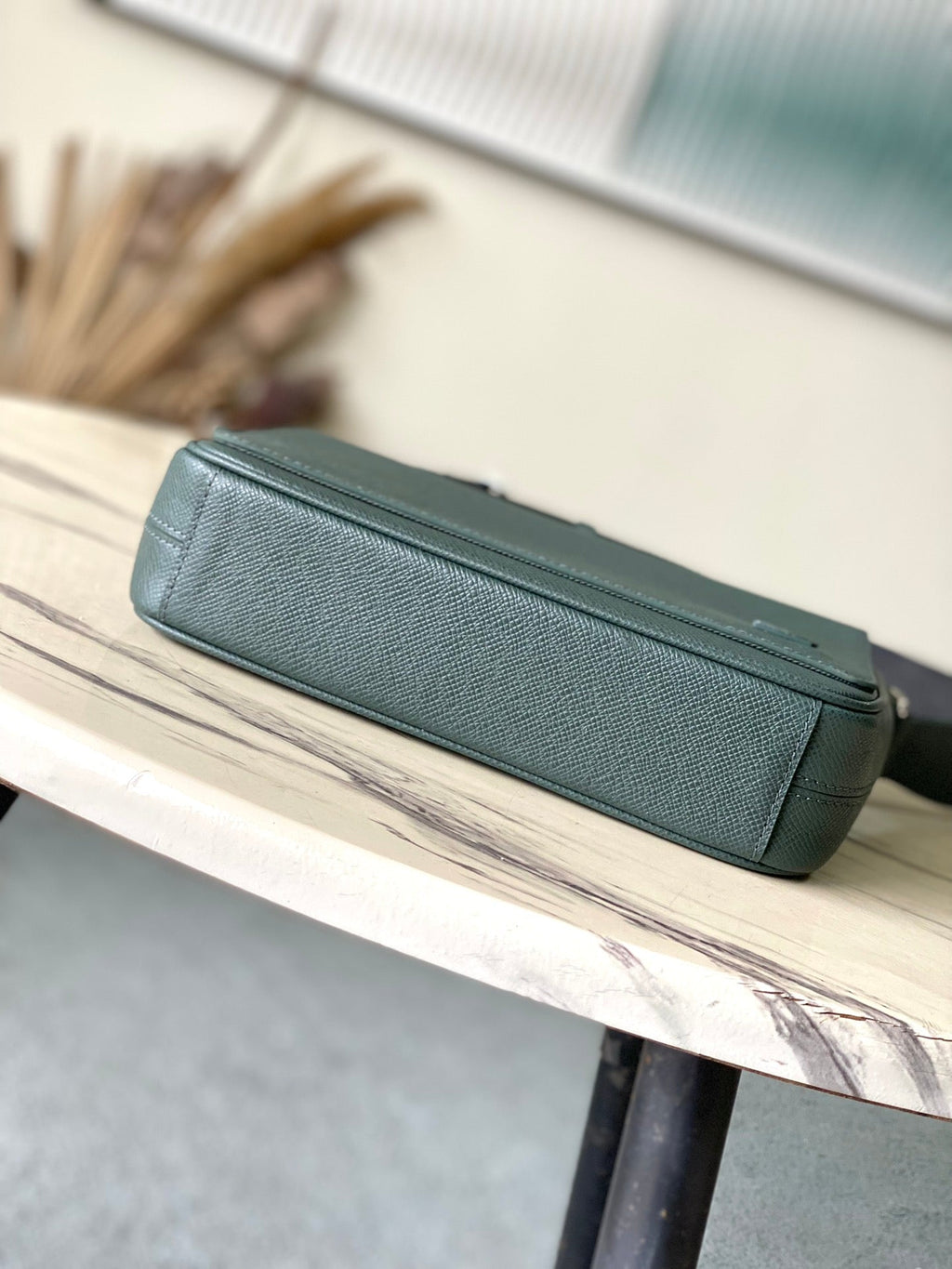 LOUIS VUITTON DISTRICT PM 26 IN CELESTE GREEN CALFSKIN