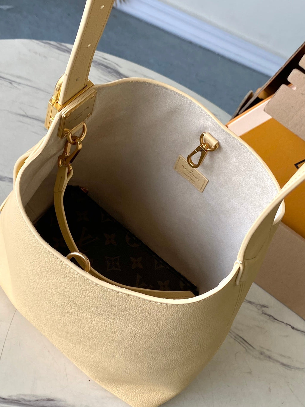 LOUIS VUITTON LOW KEY HOBO PM 28 IN URBAN YELLOW CALFSKIN GOLD BUCKLE