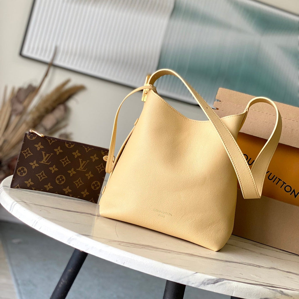 LOUIS VUITTON LOW KEY HOBO PM 28 IN URBAN YELLOW CALFSKIN GOLD BUCKLE