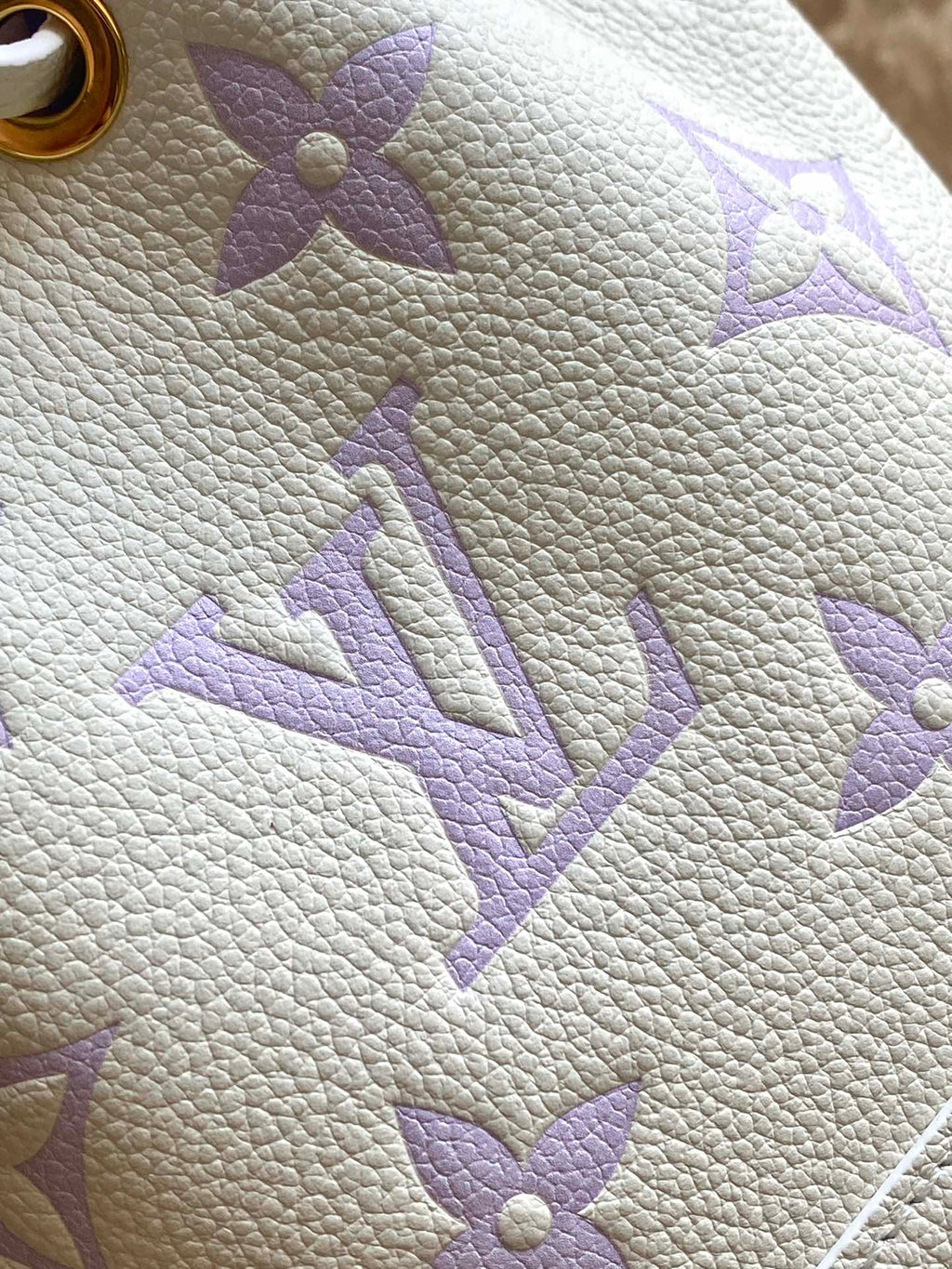LOUIS VUITTON NANO NOÉ 16 IN WHITE PURPLE MONOGRAM EMBOSSED CALFSKIN