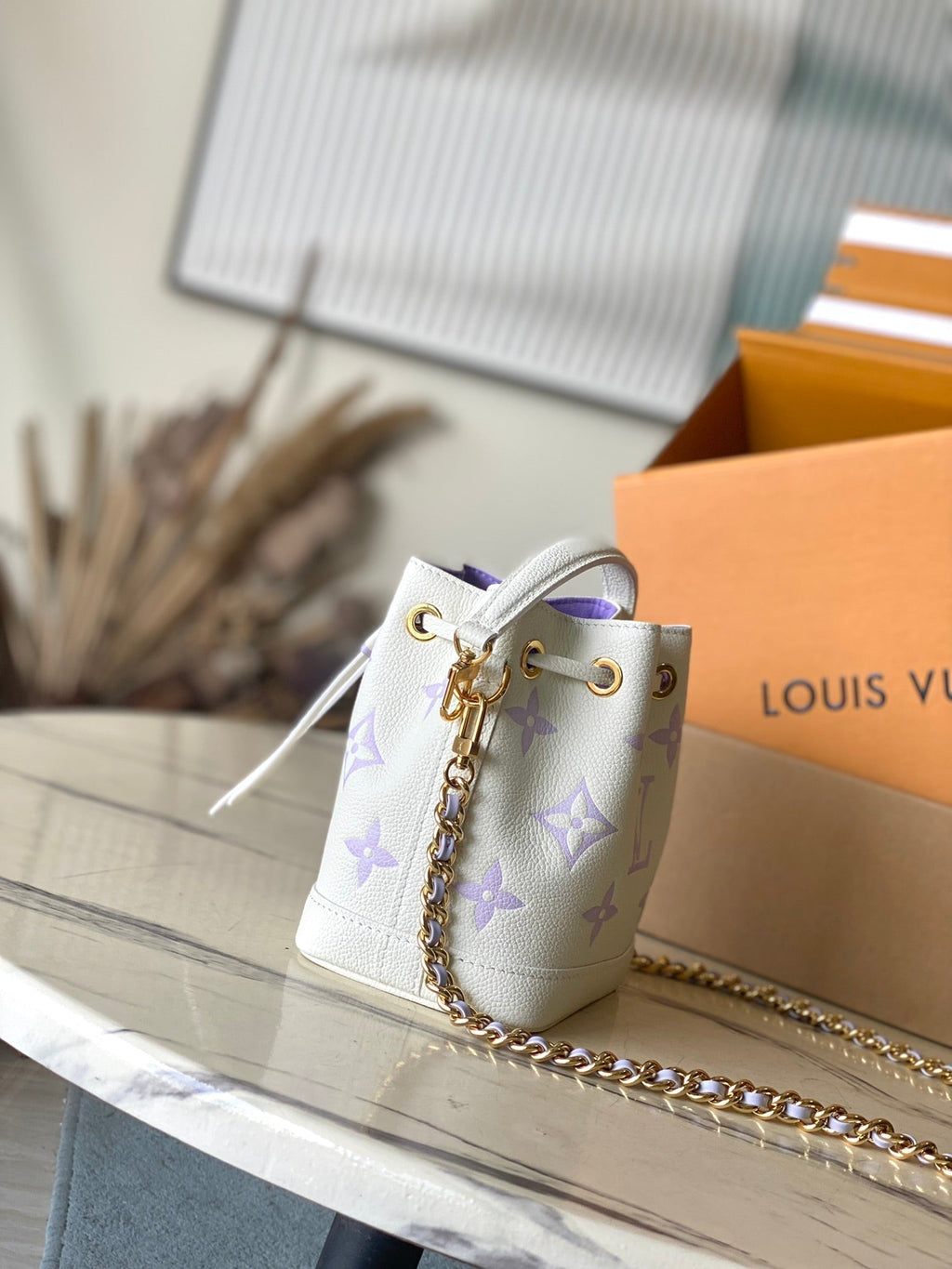 LOUIS VUITTON NANO NOÉ 16 IN WHITE PURPLE MONOGRAM EMBOSSED CALFSKIN