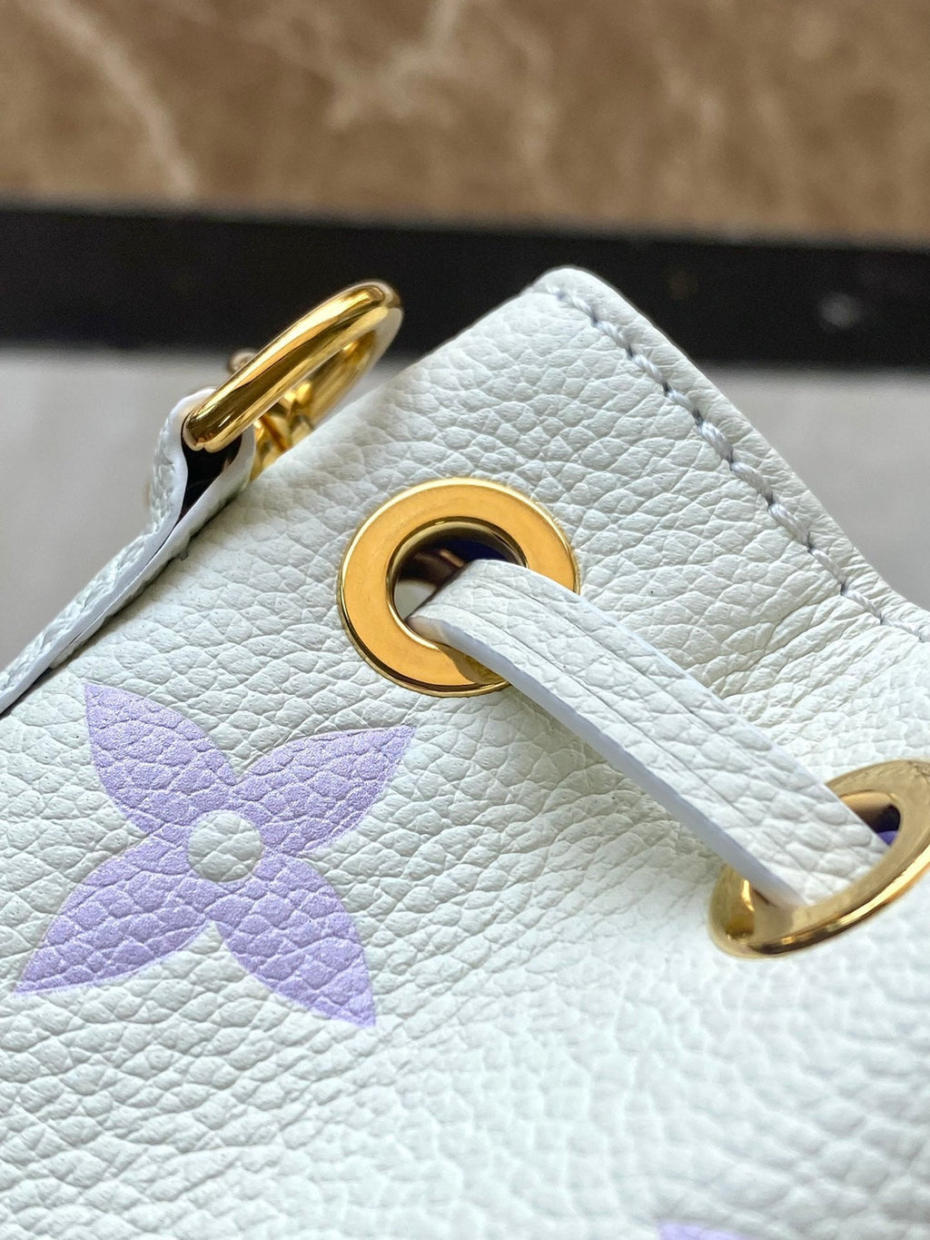 LOUIS VUITTON NANO NOÉ 16 IN WHITE PURPLE MONOGRAM EMBOSSED CALFSKIN