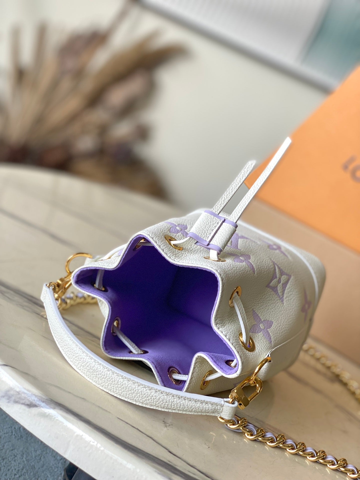 LOUIS VUITTON NANO NOÉ 16 IN WHITE PURPLE MONOGRAM EMBOSSED CALFSKIN