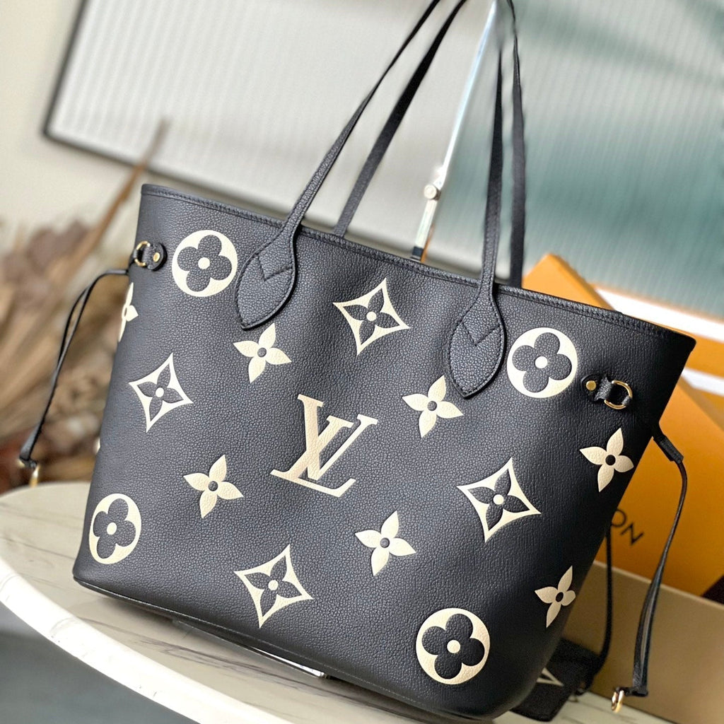 LOUIS VUITTON NEVERFULL MM 31 IN BLACK CREAM MONOGRAM EMPREINTE LEATHER