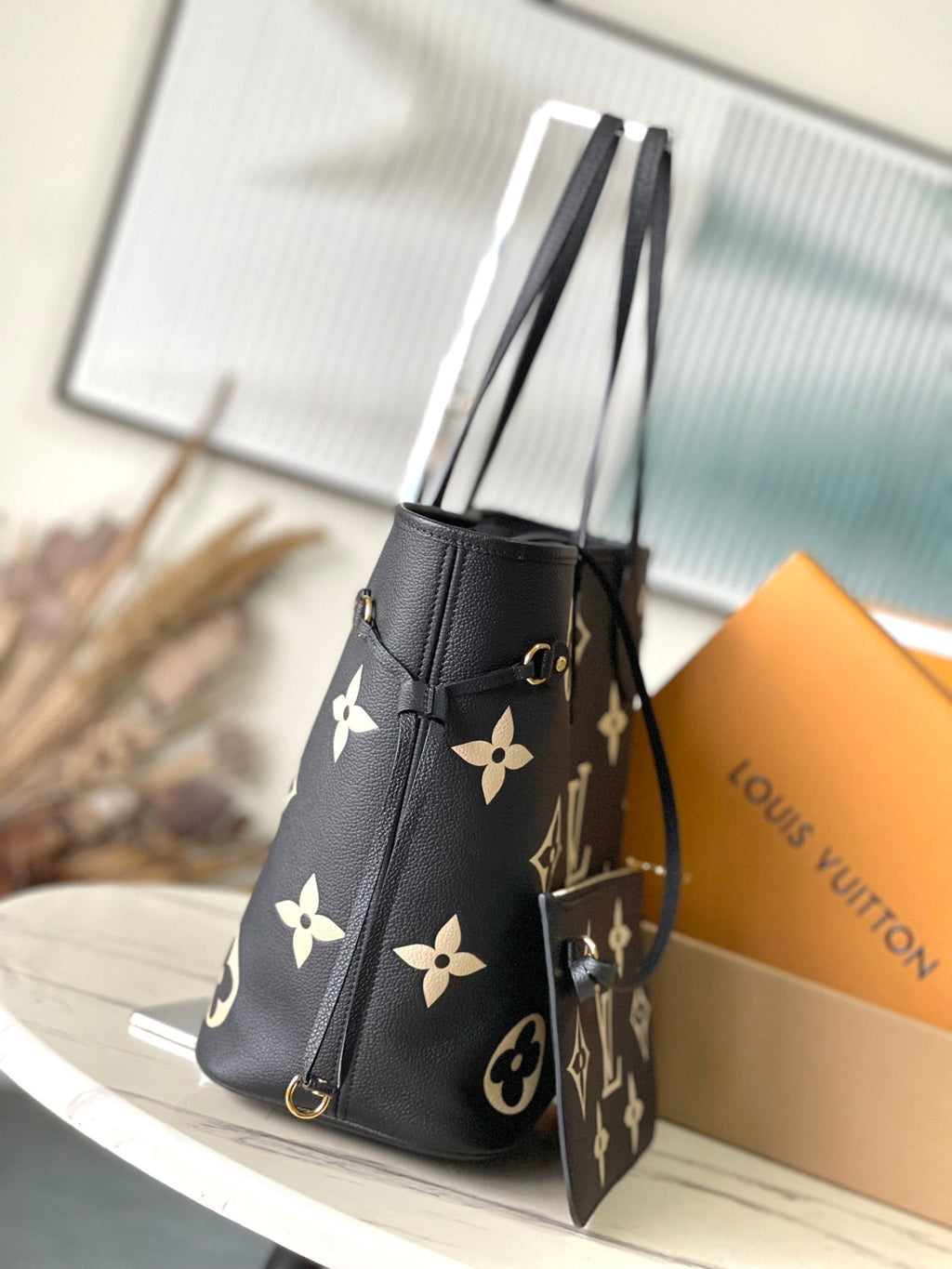 LOUIS VUITTON NEVERFULL MM 31 IN BLACK CREAM MONOGRAM EMPREINTE LEATHER
