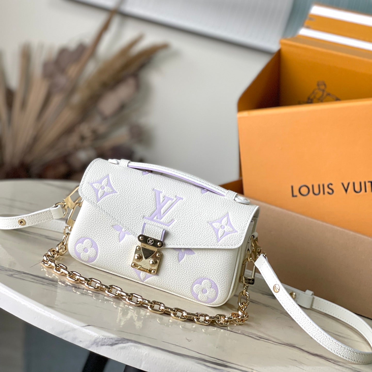 LOUIS VUITTON POCHETTE METIS EAST WEST 21 IN WHITE PURPLE MONOGRAM EMPREINTE LEATHER