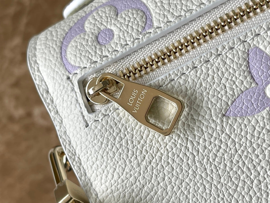 LOUIS VUITTON POCHETTE METIS EAST WEST 21 IN WHITE PURPLE MONOGRAM EMPREINTE LEATHER