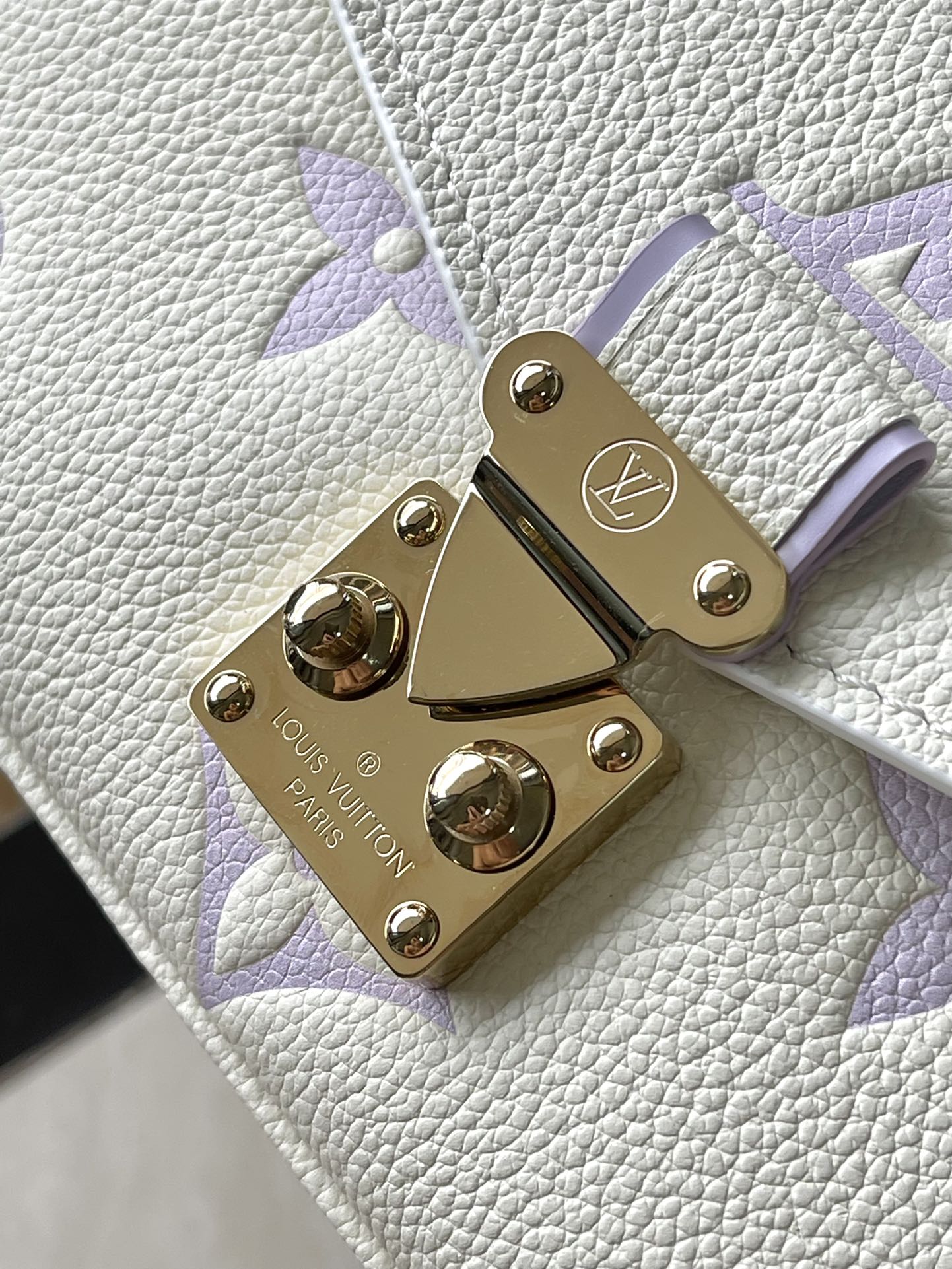 LOUIS VUITTON POCHETTE METIS EAST WEST 21 IN WHITE PURPLE MONOGRAM EMPREINTE LEATHER