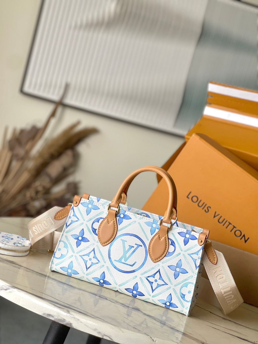 LOUIS VUITTON ONTHEGO EAST WEST 25 IN LAGOON BLUE MONOGRAM TILES CANVAS