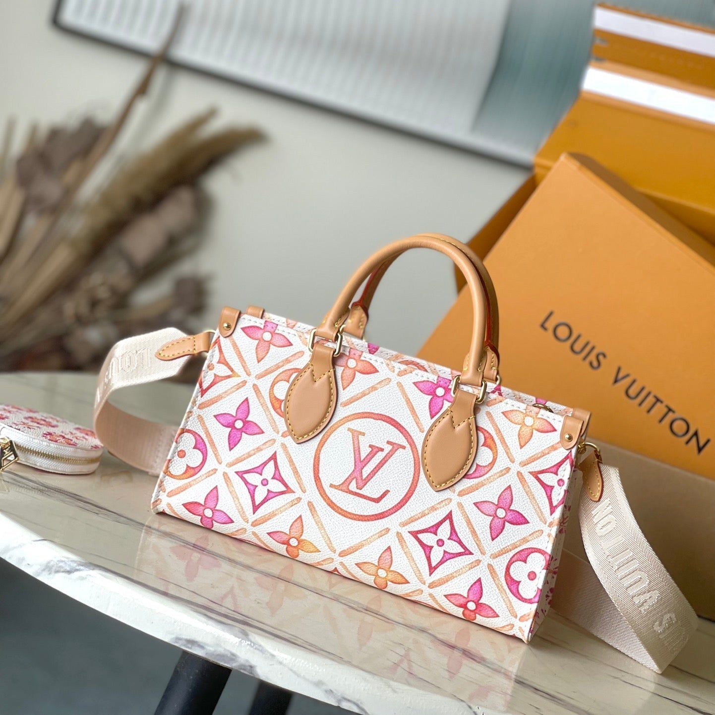 LOUIS VUITTON ONTHEGO EAST WEST 25 IN CORAL MONOGRAM TILES CANVAS