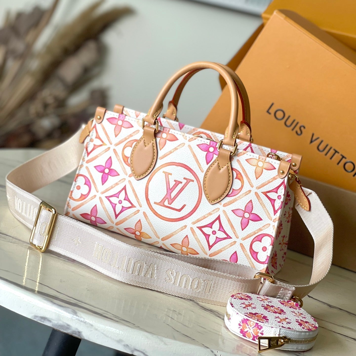LOUIS VUITTON ONTHEGO EAST WEST 25 IN CORAL MONOGRAM TILES CANVAS