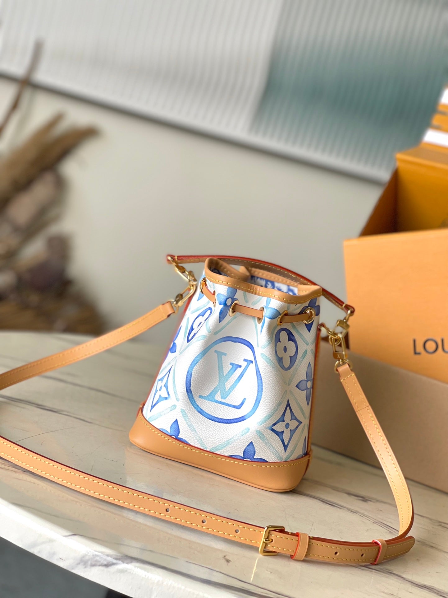 LOUIS VUITTON NANO NOÉ 16 IN LAGOON BLUE MONOGRAM TILES CANVAS