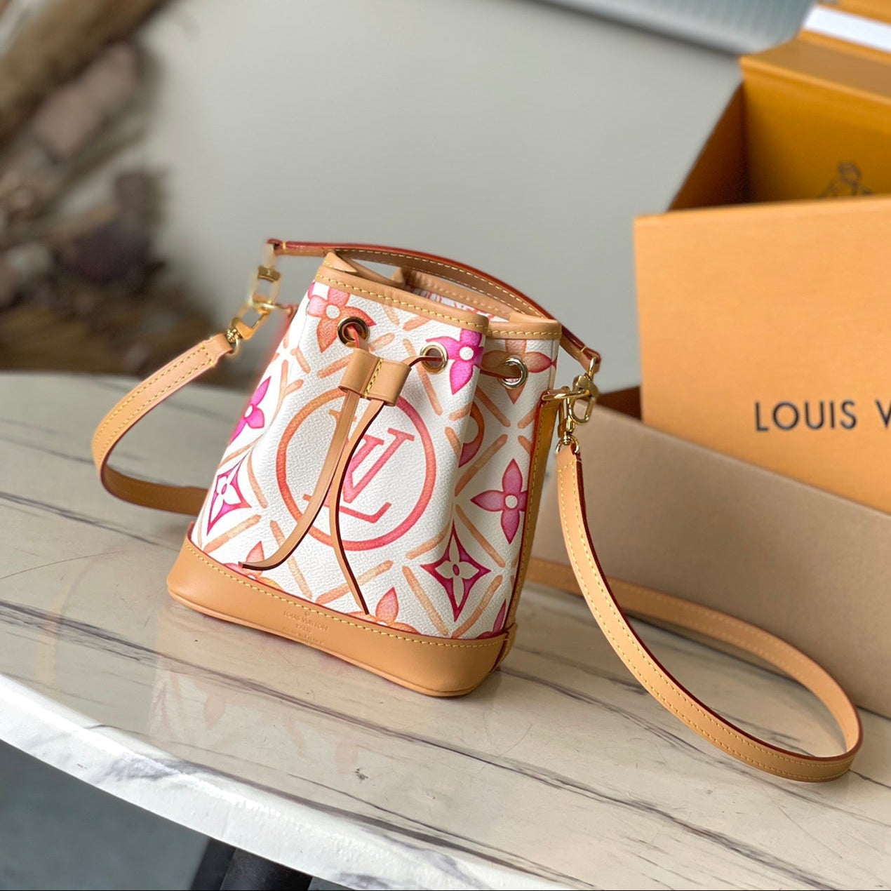 LOUIS VUITTON NANO NOÉ 16 IN CORAL MONOGRAM TILES CANVAS