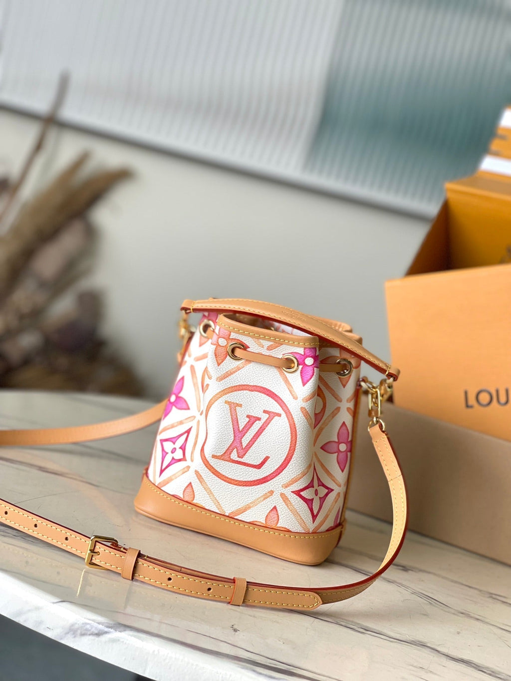 LOUIS VUITTON NANO NOÉ 16 IN CORAL MONOGRAM TILES CANVAS