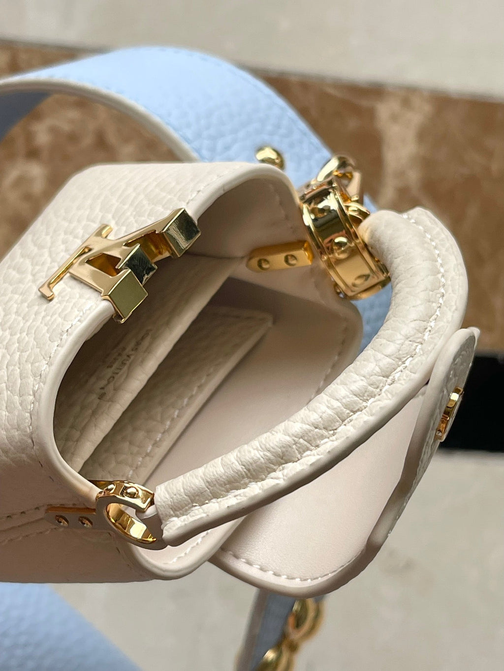 LOUIS VUITTON CAPUCINES MINI 21 IN CANDY BLUE TAURILLON GOLD HARDWARE