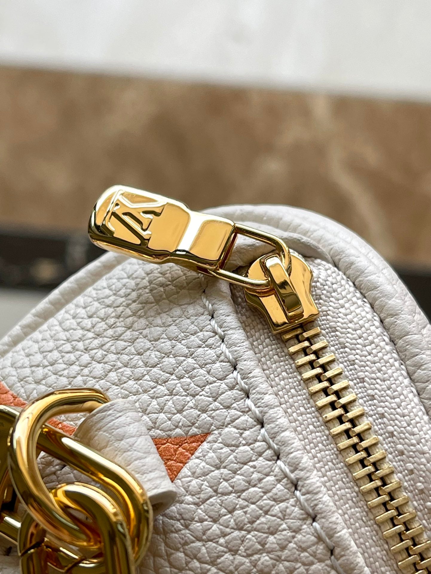 LOUIS VUITTON MINI BUMBAG 17 IN WHITE ORANGE MONOGRAM EMPREINTE LEATHER GOLD HARDWARE