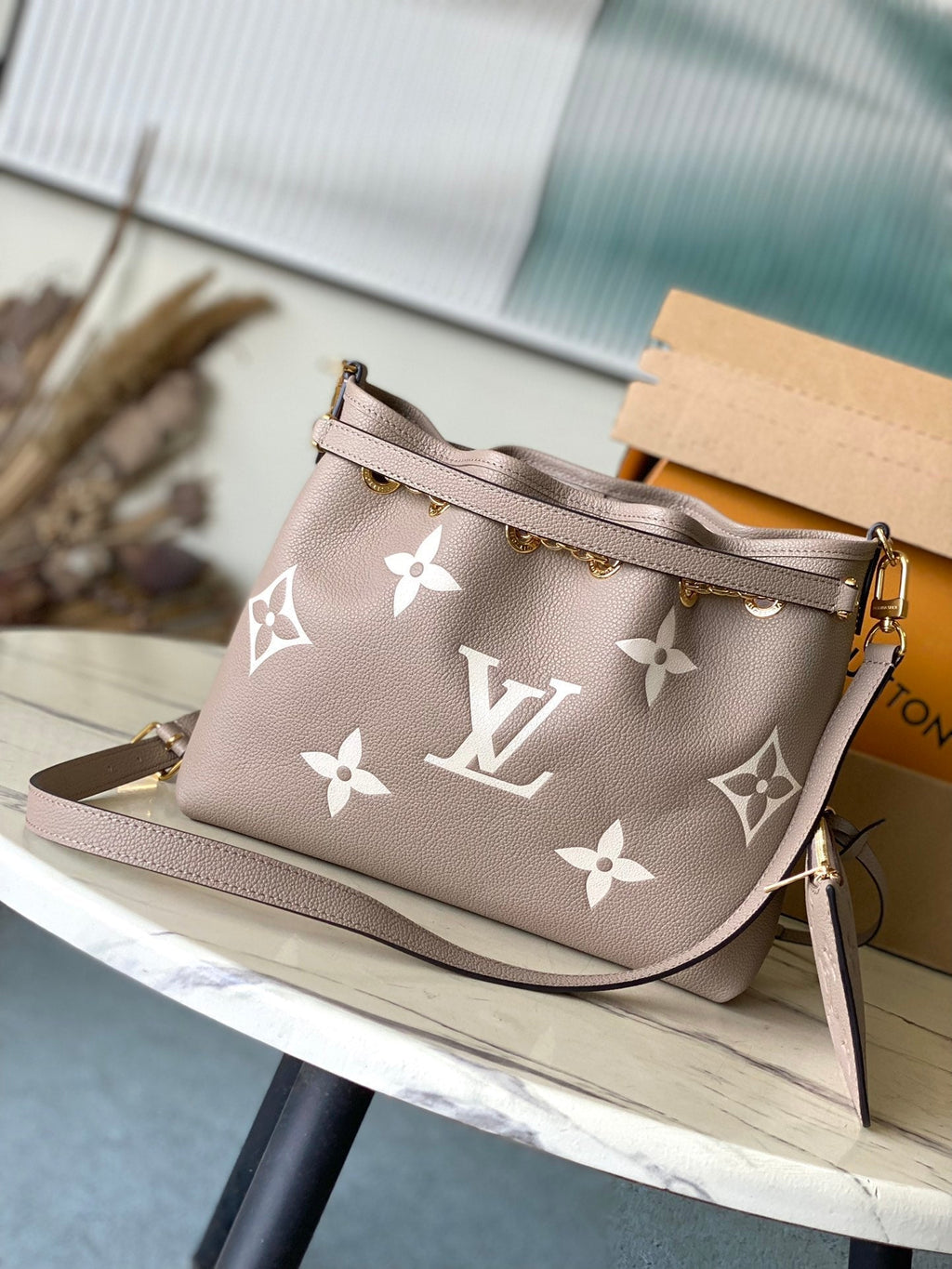 LOUIS VUITTON BUNDLE 28 IN TOURTERELLE WHITE MONOGRAM EMPREINTE LEATHER GOLD HARDWARE