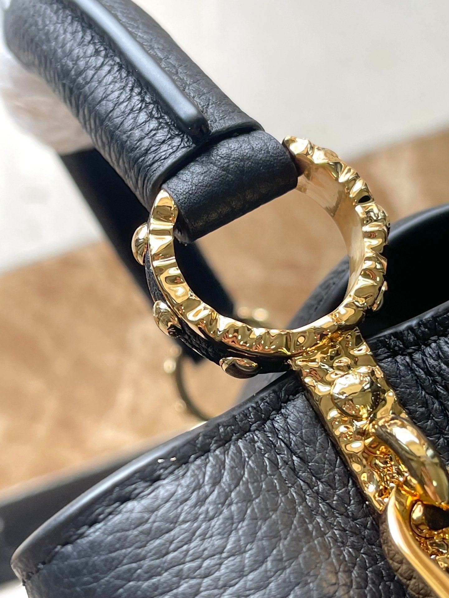 LOUIS VUITTON CAPUCINES EAST-WEST MINI 22 IN BLACK CALFSKIN GOLD HARDWARE