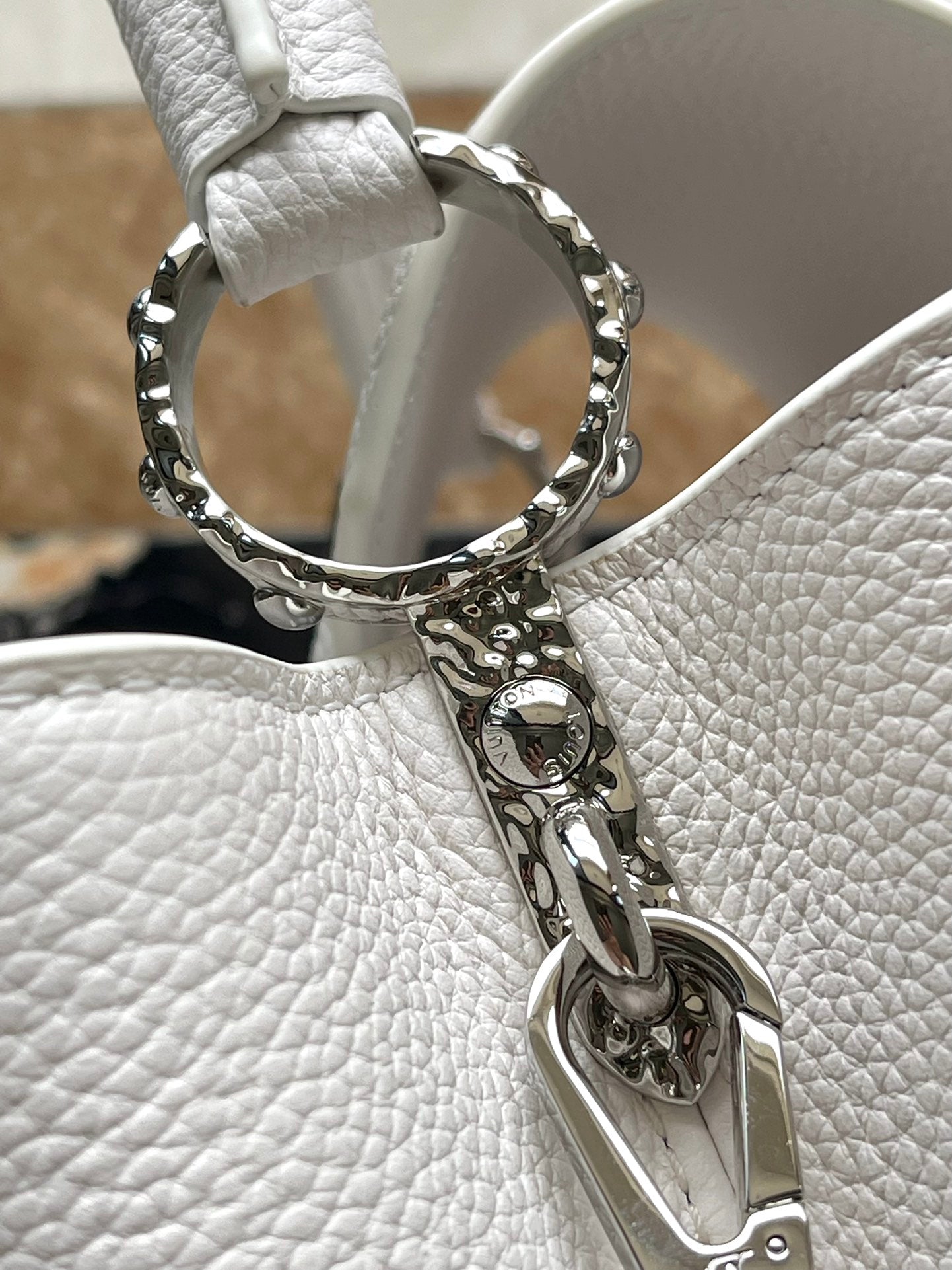 LOUIS VUITTON CAPUCINES EAST-WEST 33 IN WHITE CALFSKIN SILVER HARDWARE