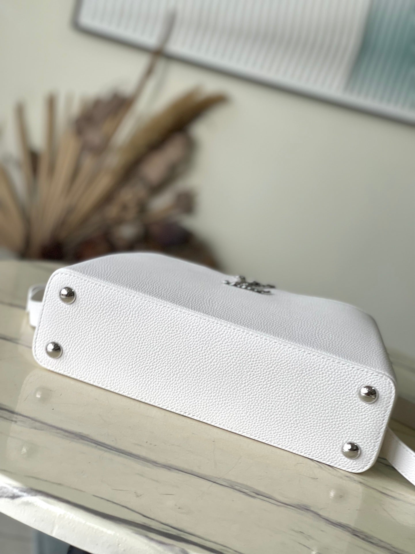 LOUIS VUITTON CAPUCINES EAST-WEST 33 IN WHITE CALFSKIN SILVER HARDWARE