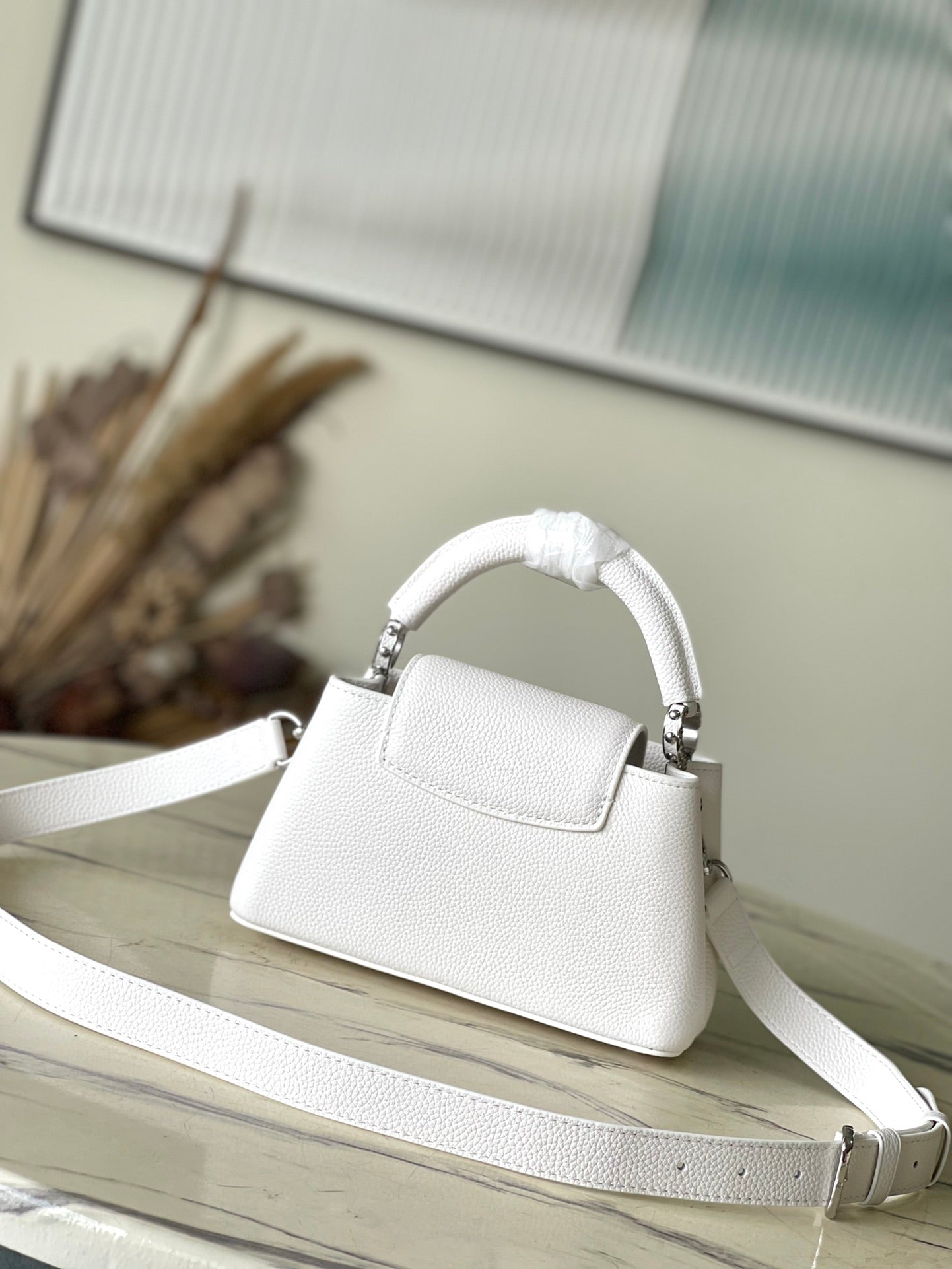LOUIS VUITTON CAPUCINES EAST-WEST MINI 22 IN WHITE CALFSKIN SILVER HARDWARE