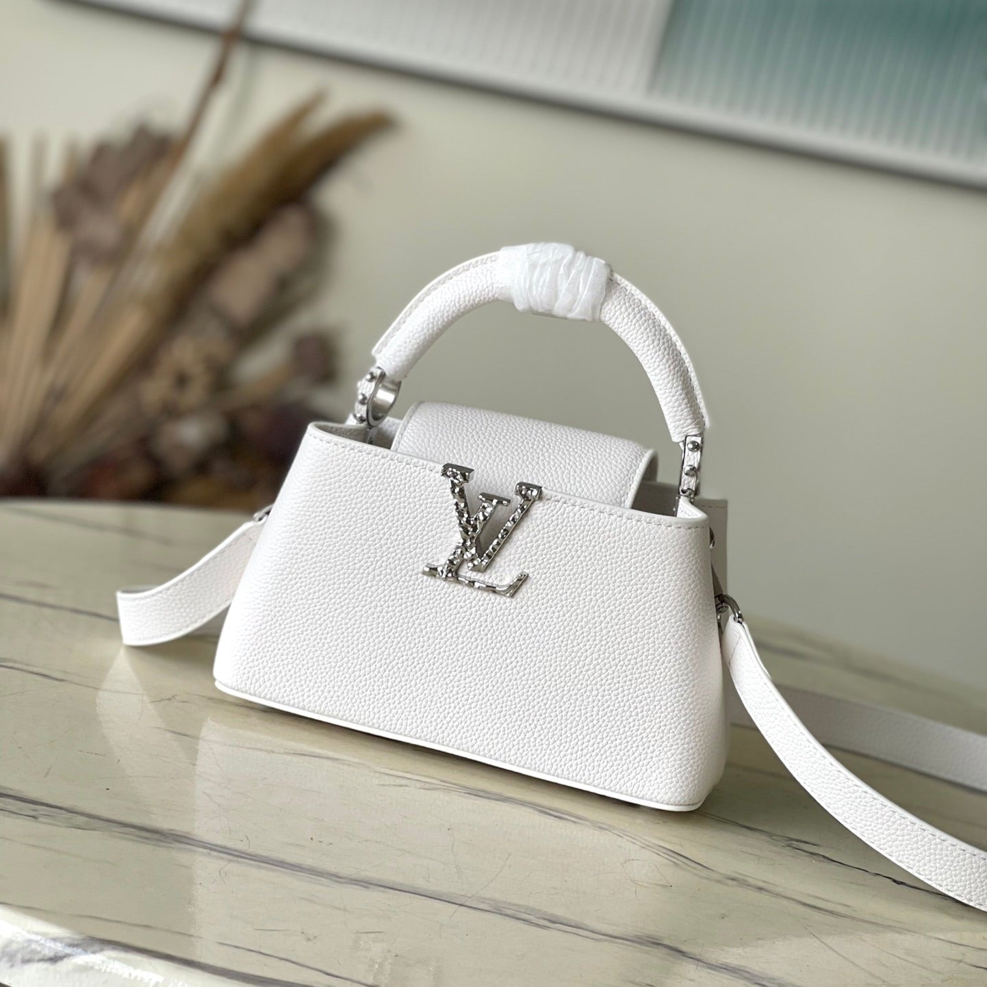 LOUIS VUITTON CAPUCINES EAST-WEST MINI 22 IN WHITE CALFSKIN SILVER HARDWARE