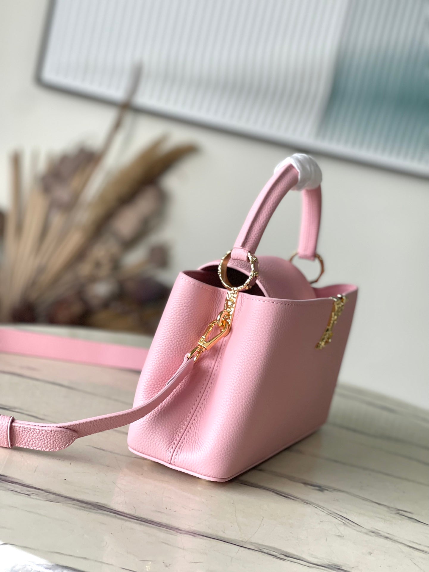 LOUIS VUITTON CAPUCINES EAST-WEST 33 IN BLUSH PINK CALFSKIN GOLD HARDWARE
