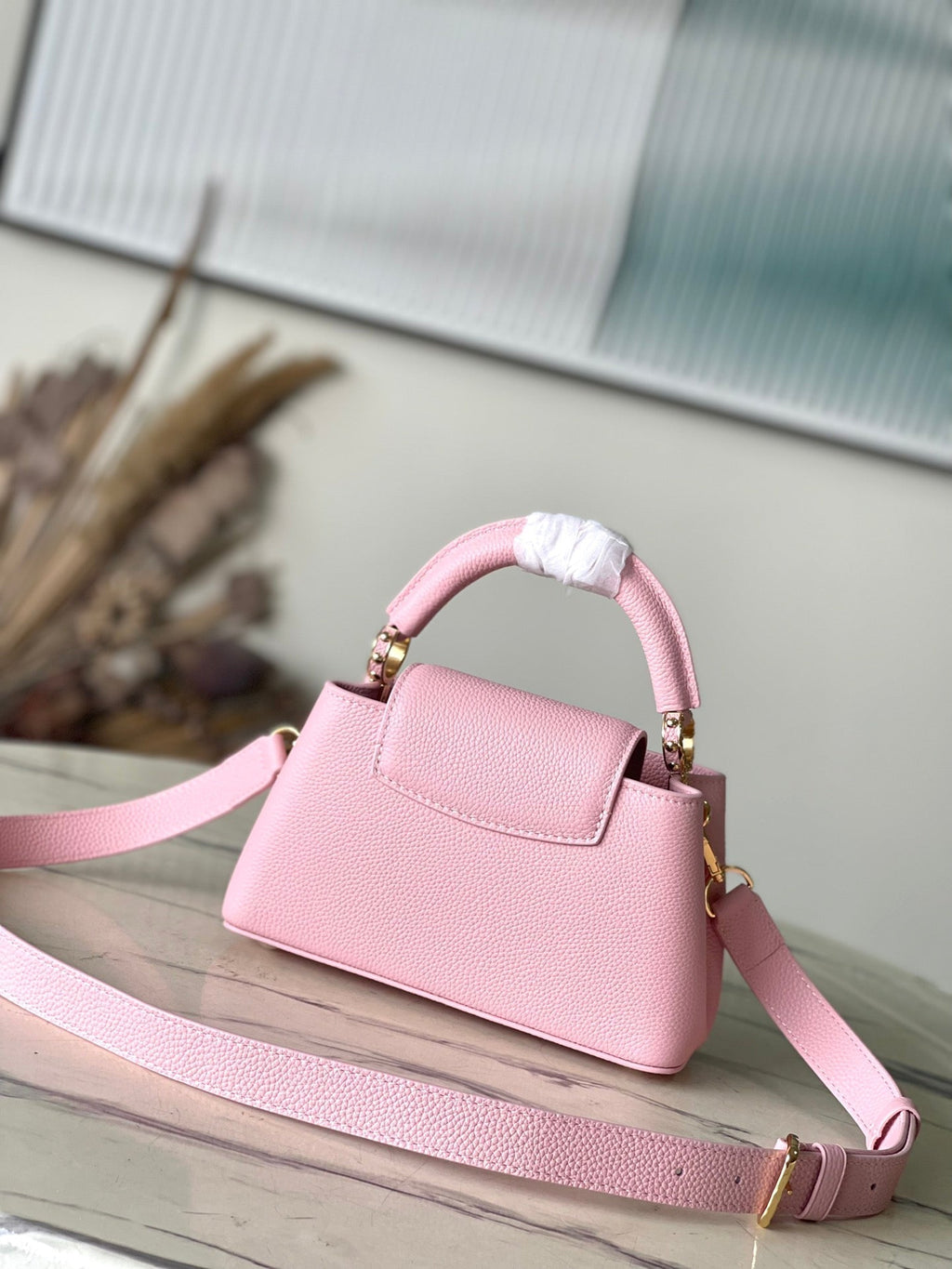 LOUIS VUITTON CAPUCINES EAST-WEST MINI 22 IN BLUSH PINK CALFSKIN GOLD HARDWARE