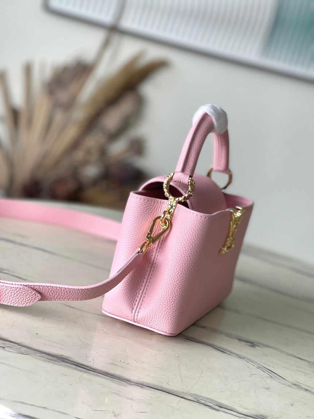 LOUIS VUITTON CAPUCINES EAST-WEST MINI 22 IN BLUSH PINK CALFSKIN GOLD HARDWARE