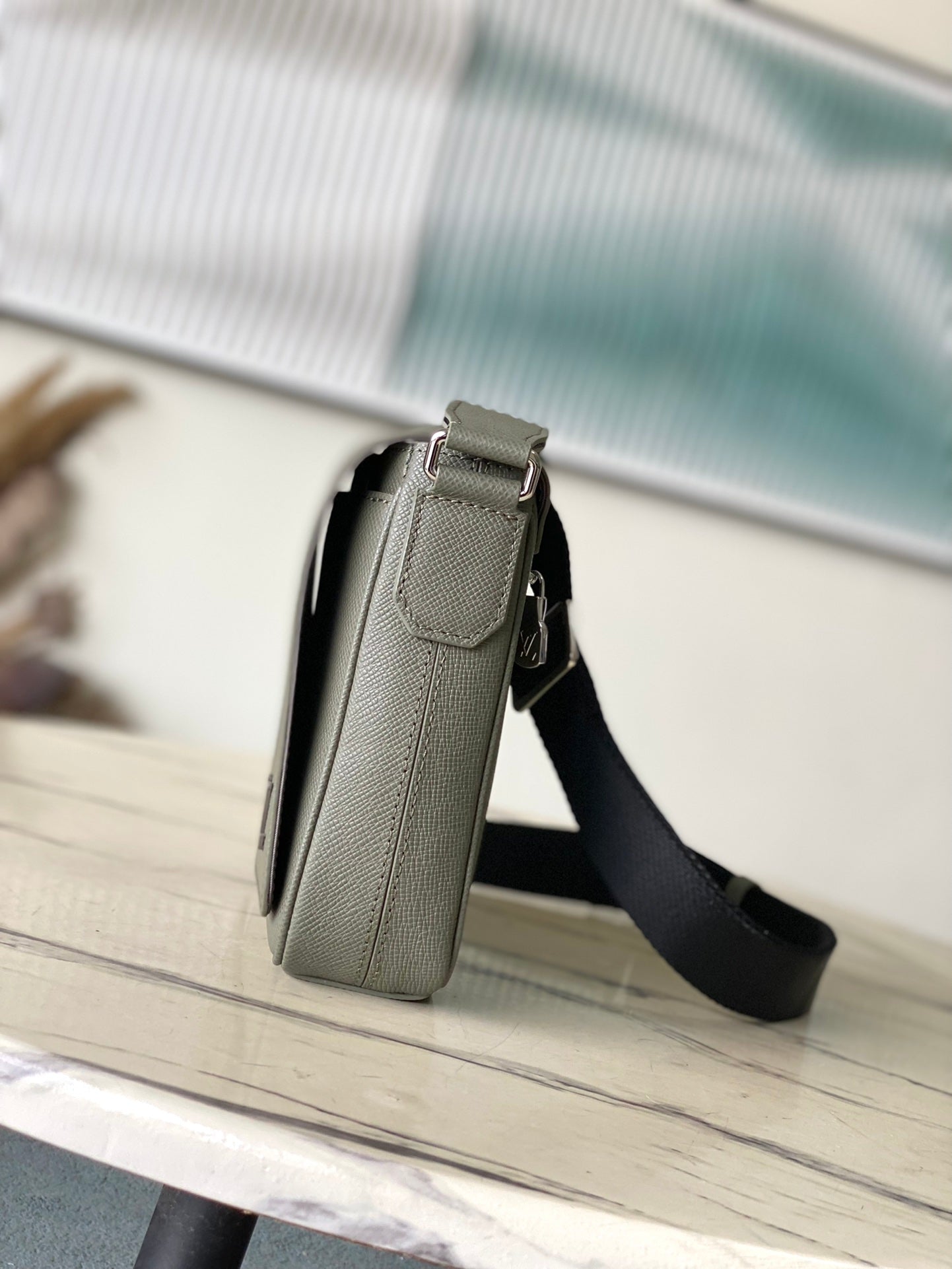 LOUIS VUITTON DISTRICT PM 26 IN KHAKI GREEN CALFSKIN