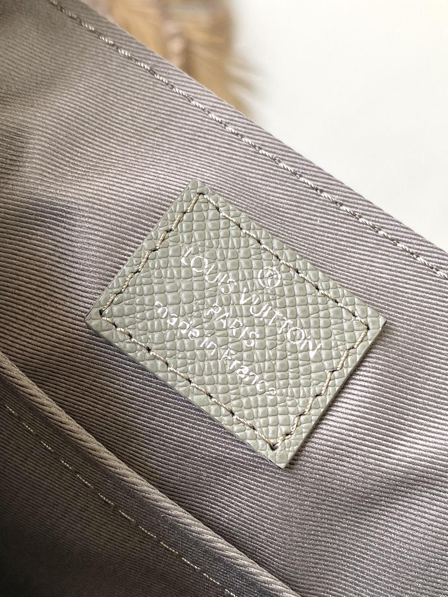 LOUIS VUITTON DISTRICT PM 26 IN KHAKI GREEN CALFSKIN