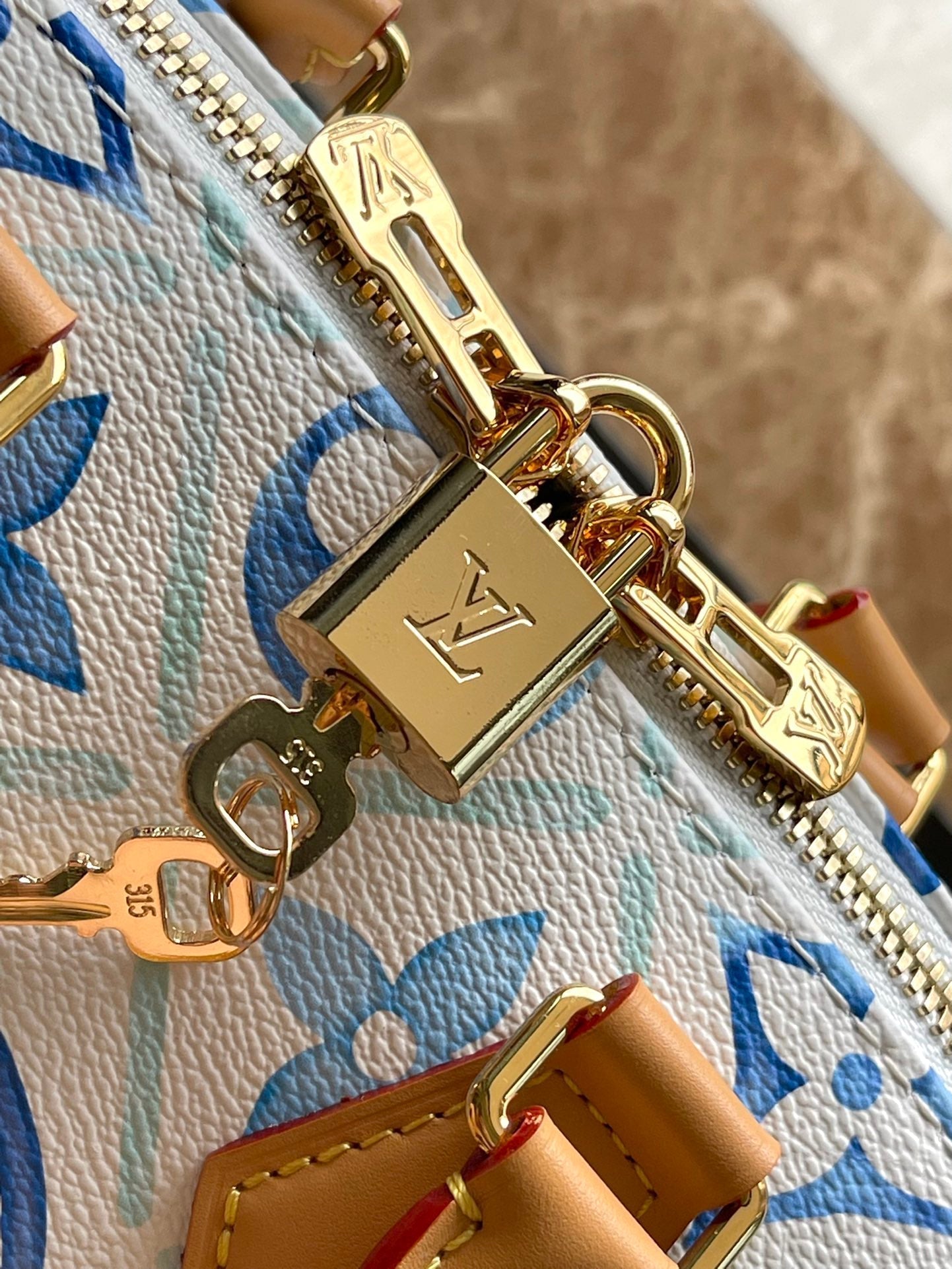LOUIS VUITTON SPEEDY BANDOULIÈRE 20 IN LAGOON BLUE MONOGRAM TILES CANVAS GOLD BUCKLE