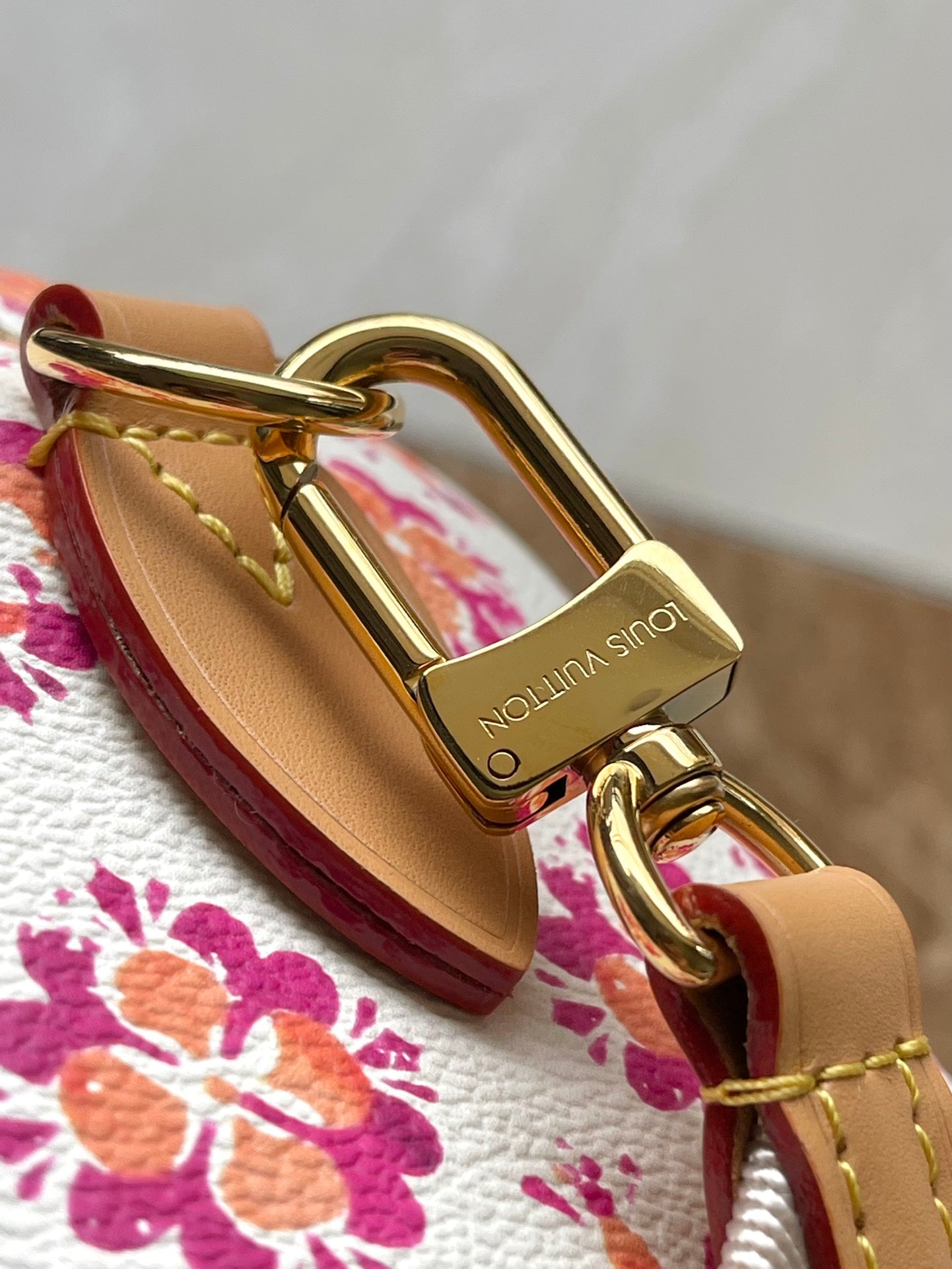 LOUIS VUITTON SPEEDY BANDOULIÈRE 20 IN CORAL MONOGRAM TILES CANVAS GOLD BUCKLE