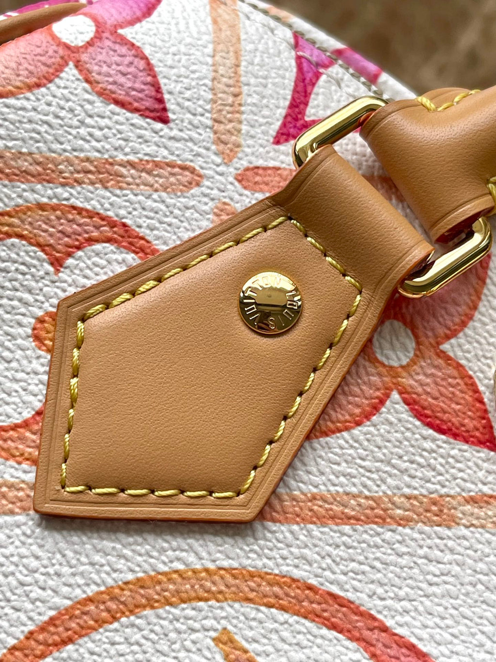 LOUIS VUITTON SPEEDY BANDOULIÈRE 20 IN CORAL MONOGRAM TILES CANVAS GOLD BUCKLE