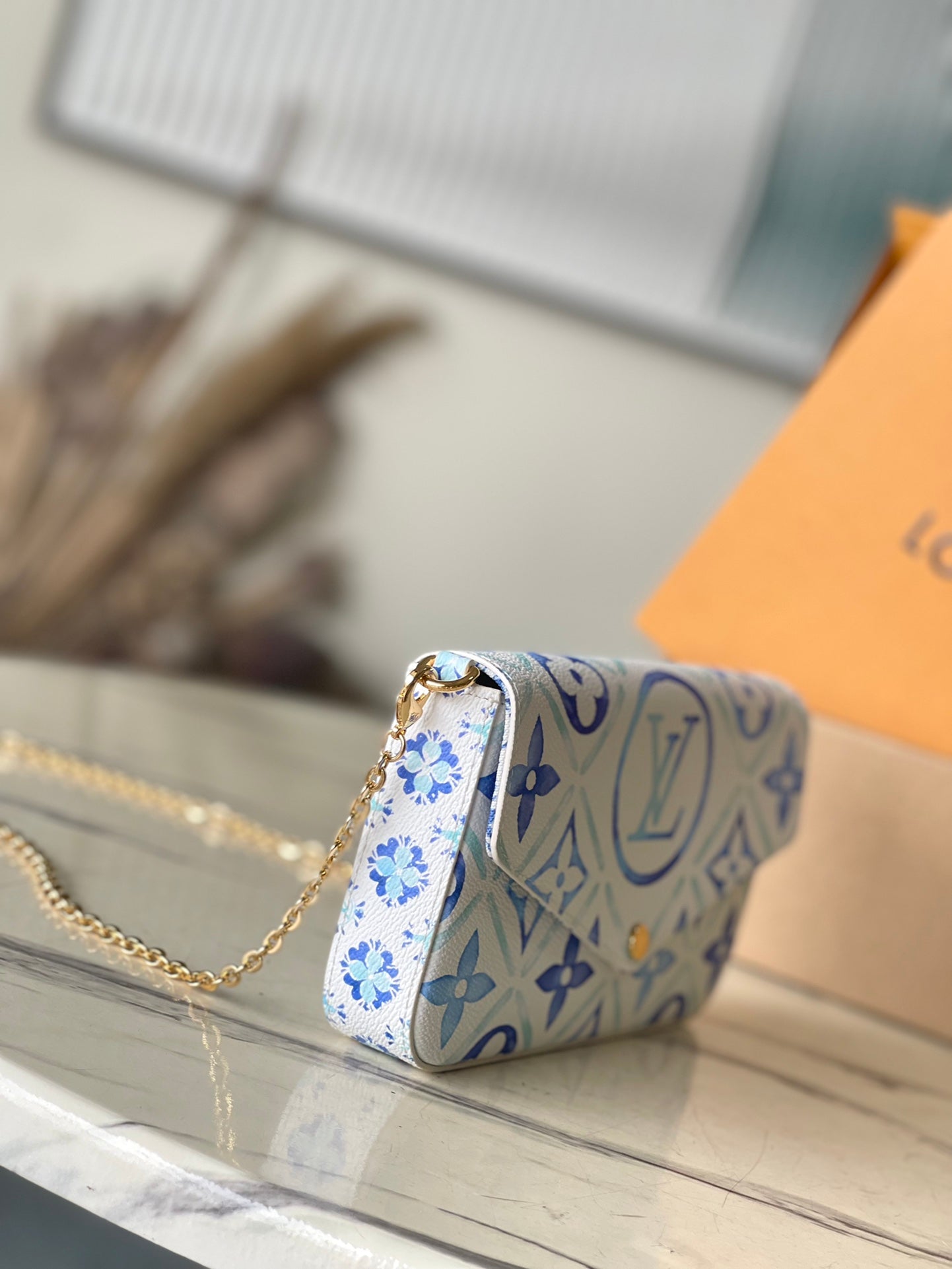 LOUIS VUITTON FÉLICIE POCHETTE 21 IN LAGOON BLUE MONOGRAM TILES CANVAS