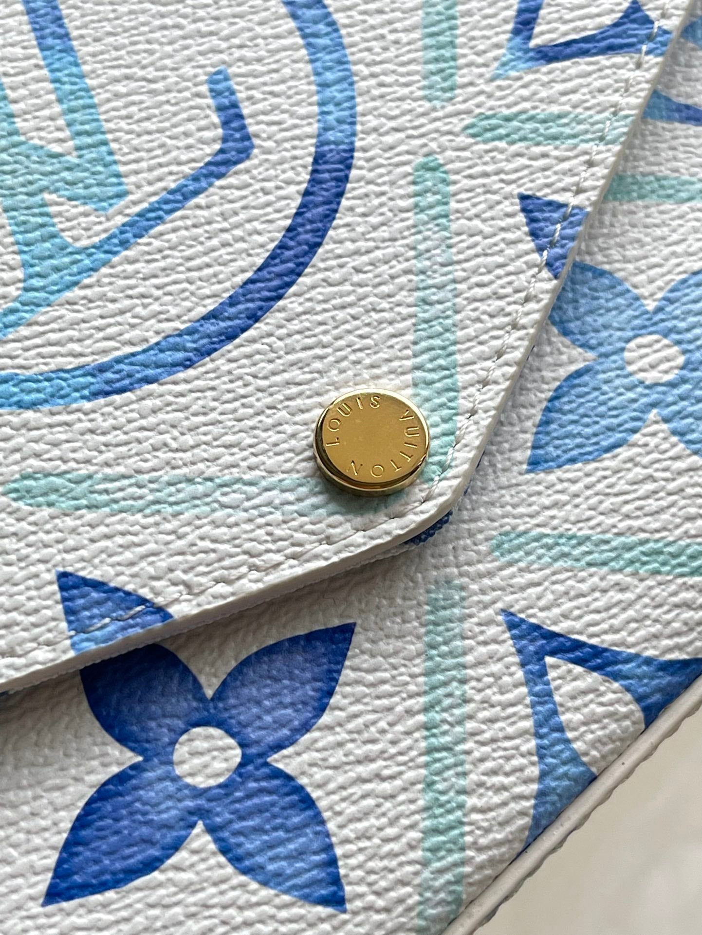 LOUIS VUITTON FÉLICIE POCHETTE 21 IN LAGOON BLUE MONOGRAM TILES CANVAS