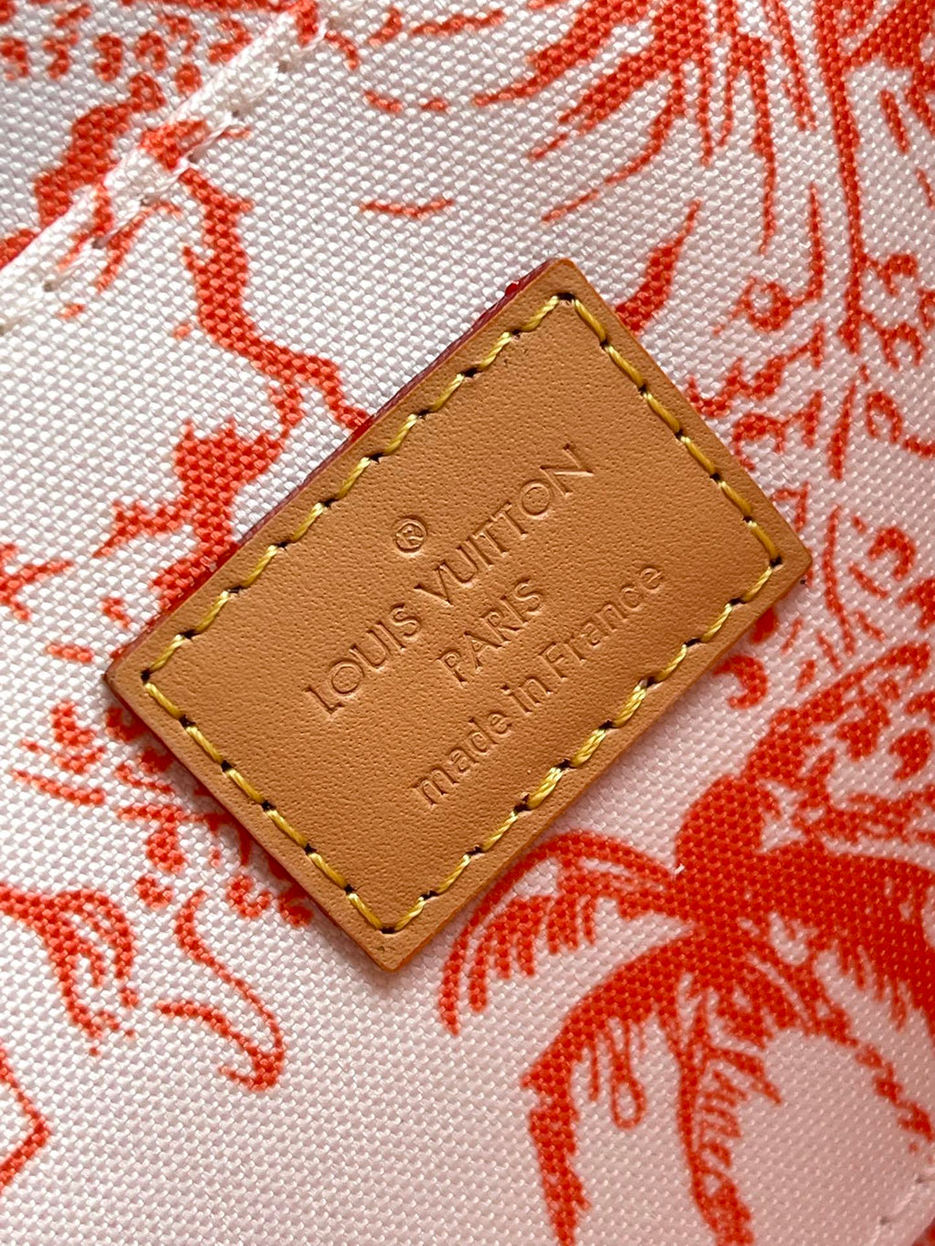 LOUIS VUITTON FÉLICIE POCHETTE 21 IN CORAL MONOGRAM TILES CANVAS