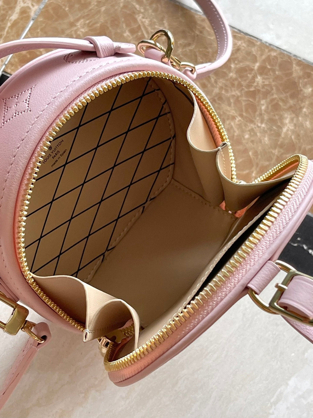 LOUIS VUITTON MINI BOITE CHAPEAU 13 IN LIGHT PINK MONOGRAM PERFORATED CALFSKIN