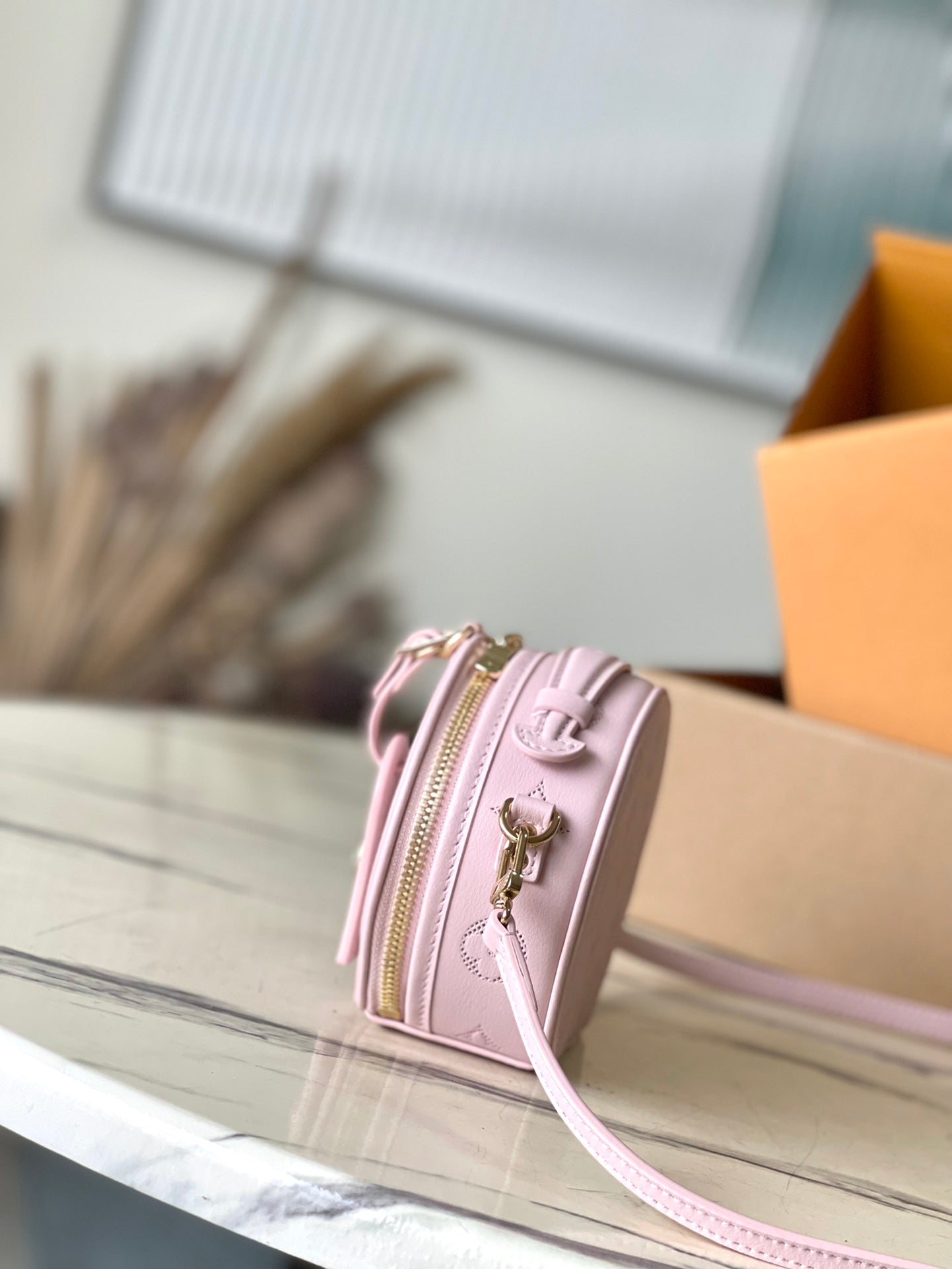 LOUIS VUITTON MINI BOITE CHAPEAU 13 IN LIGHT PINK MONOGRAM PERFORATED CALFSKIN