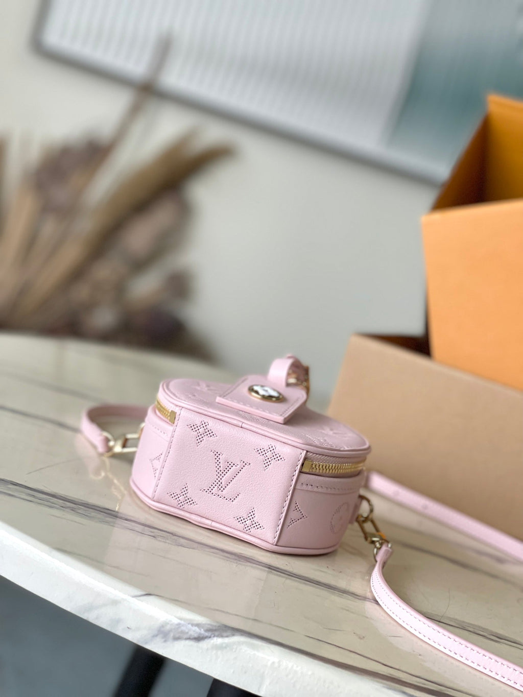 LOUIS VUITTON MINI BOITE CHAPEAU 13 IN LIGHT PINK MONOGRAM PERFORATED CALFSKIN