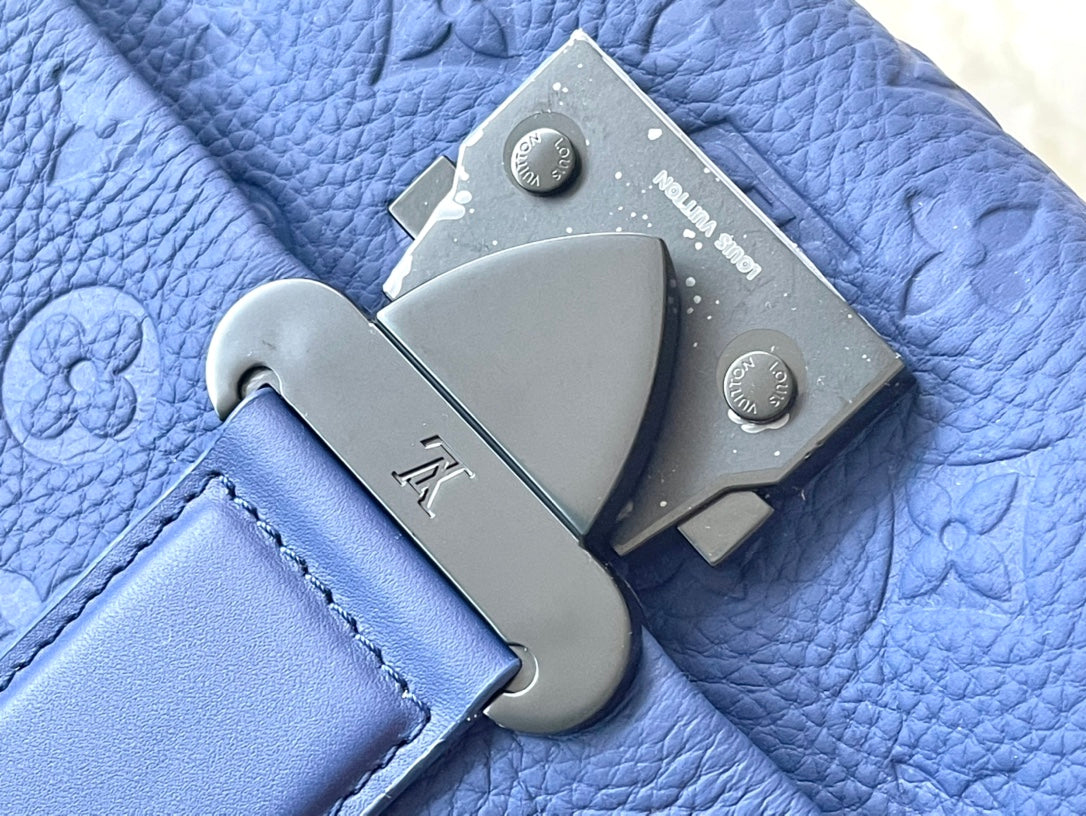 LOUIS VUITTON S-CAPE MESSENGER 28 IN SAPPHIRE BLUE TAURILLON