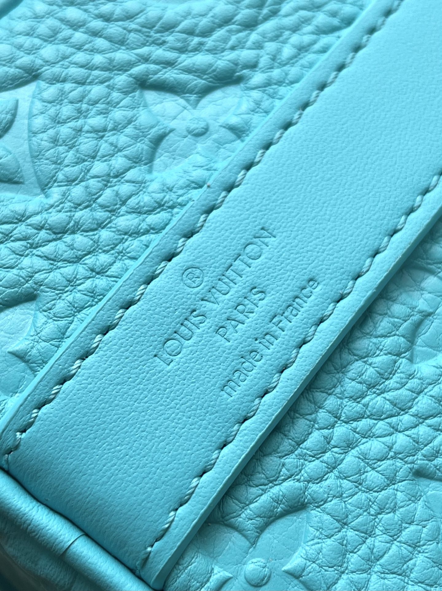 LOUIS VUITTON KEEPALL BANDOULIÈRE 25 IN TURQUOISE BLUE MONOGRAM EMBOSSED CALFSKIN