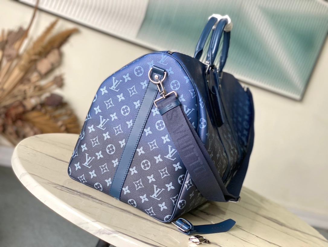 LOUIS VUITTON KEEPALL BANDOULIÈRE 55 IN NAVY GREEN MONOGRAM GRADIENT CANVAS