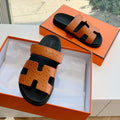 HERMES CHYPRE SANDAL IN VIVID ORANGE GRAINED CALFSKIN