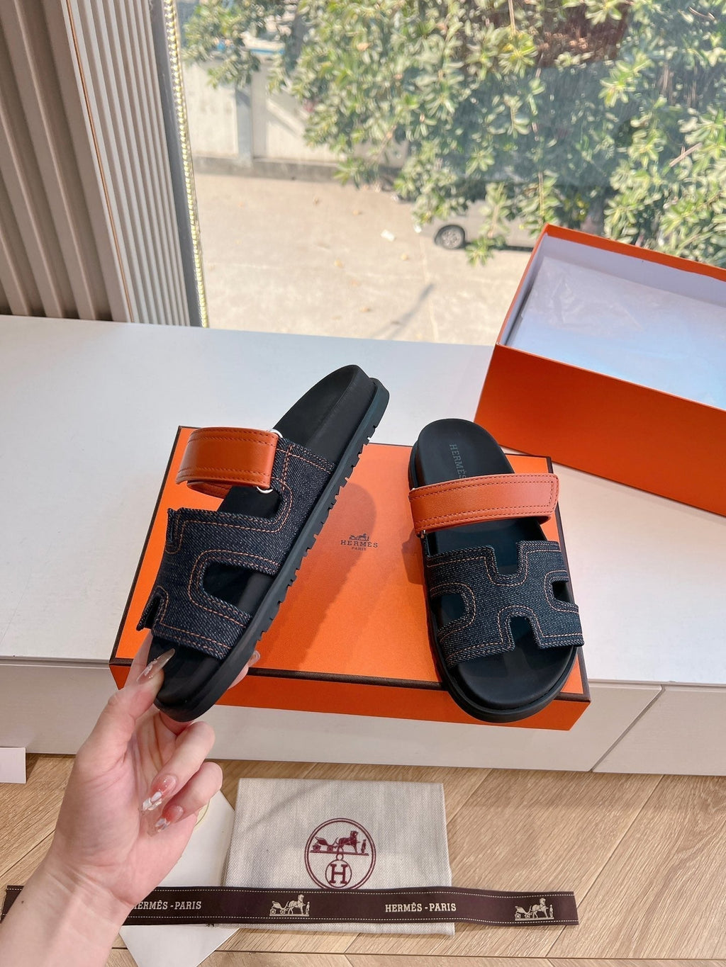 HERMES CHYPRE SANDAL IN BLACK DENIM AND VIVID ORANGE CALFSKIN