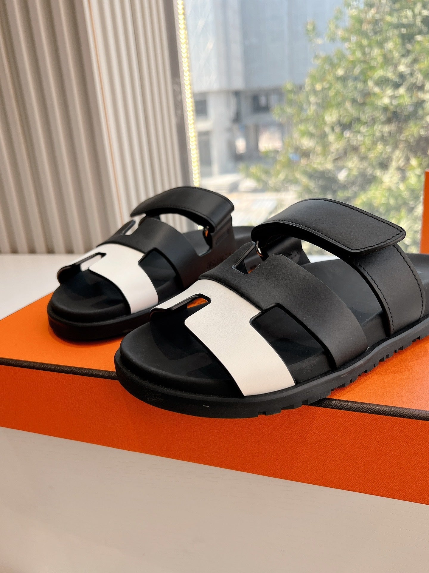 HERMES CHYPRE SANDAL IN BLACK MIX WHITE CALFSKIN