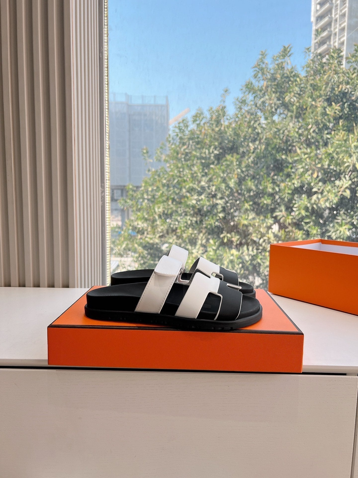 HERMES CHYPRE SANDAL IN WHITE MIX BLACK CALFSKIN