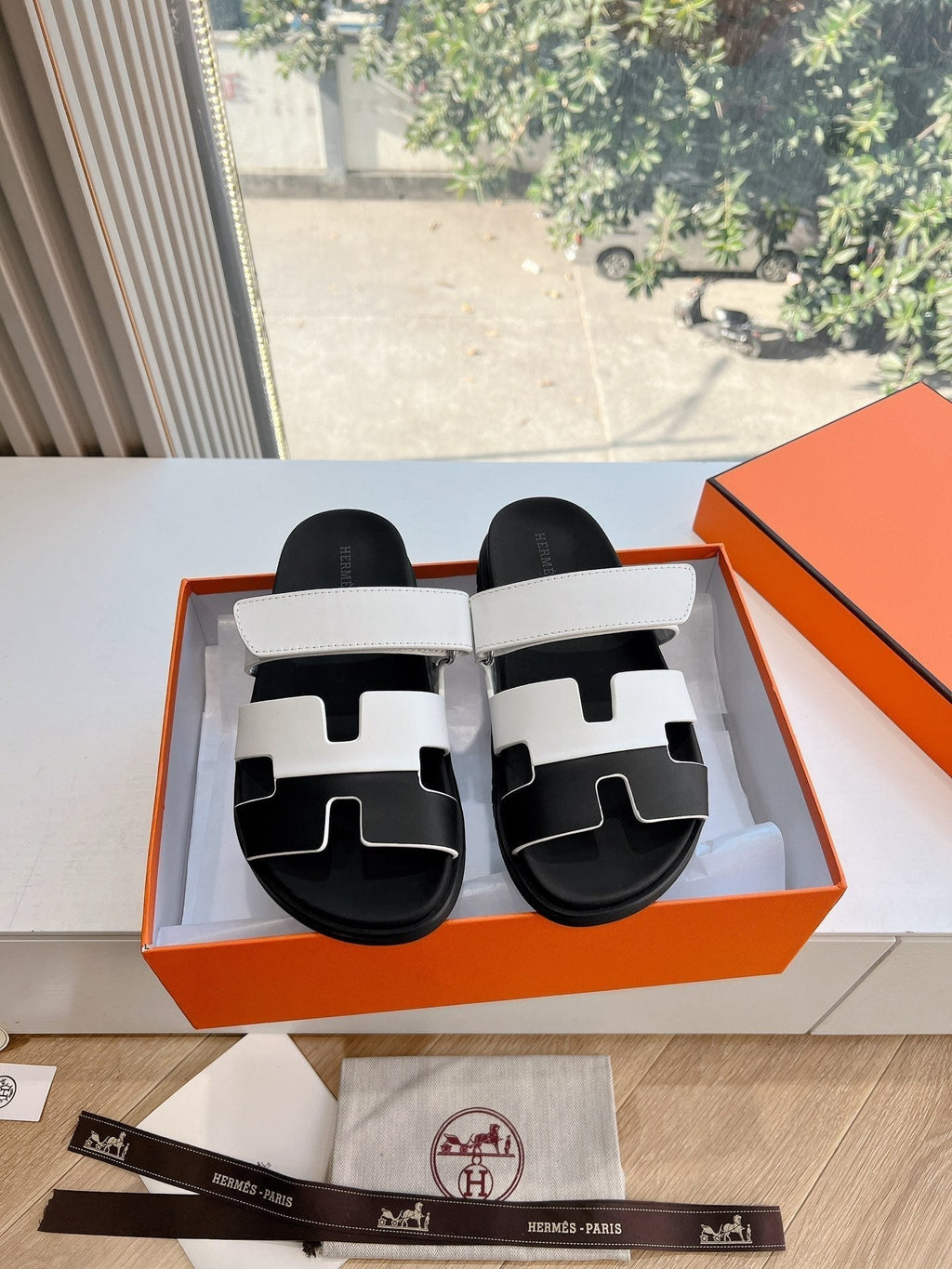 HERMES CHYPRE SANDAL IN WHITE MIX BLACK CALFSKIN
