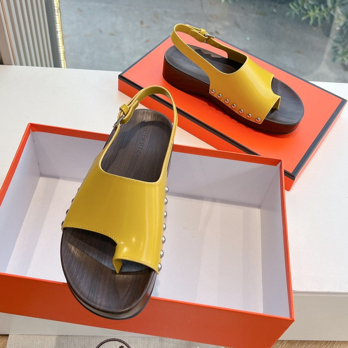 HERMES FLAT SANDAL IN CORN YELLOW CALFSKIN